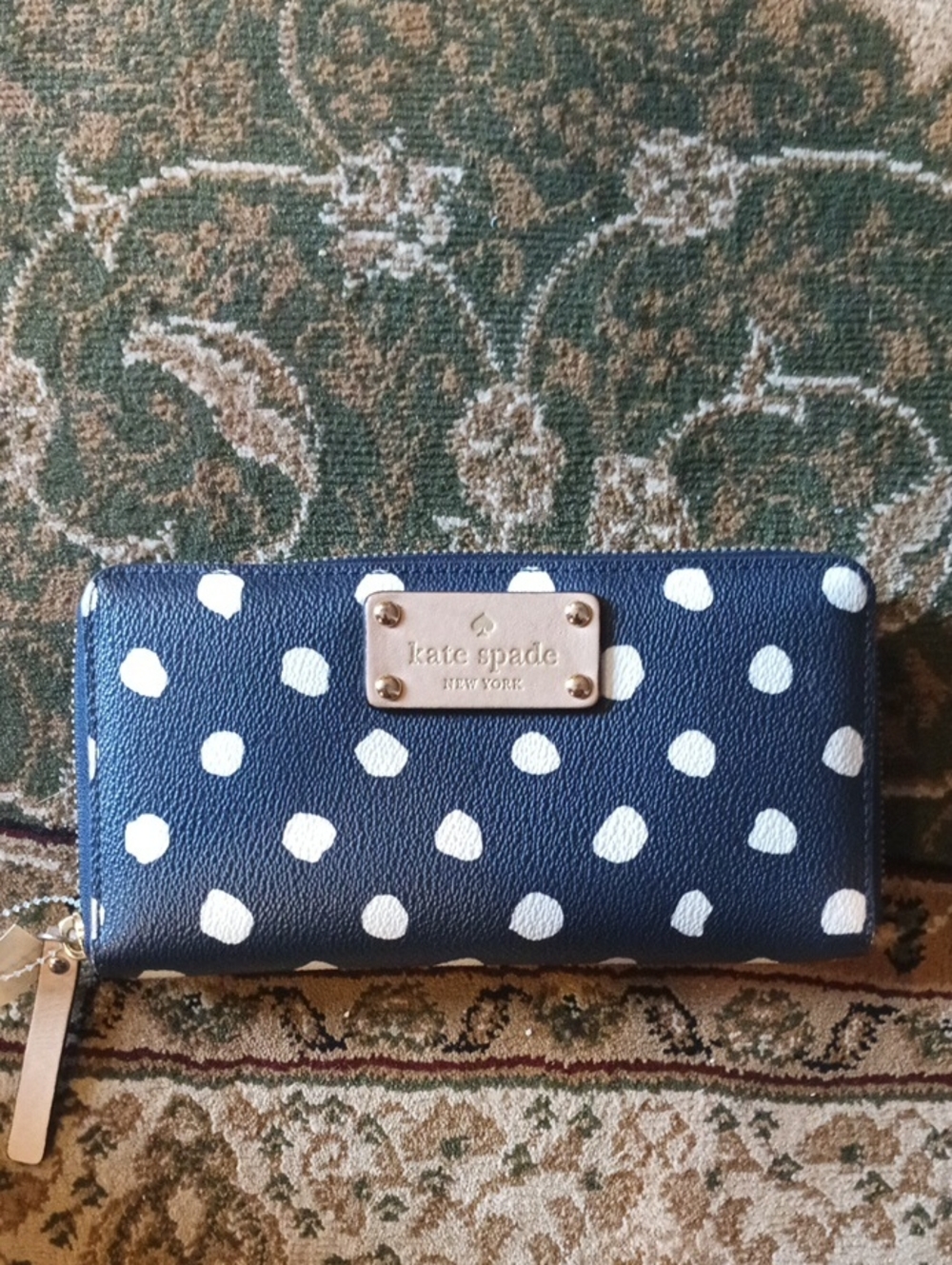 kate spade navy and white polka dot zip-around wallet